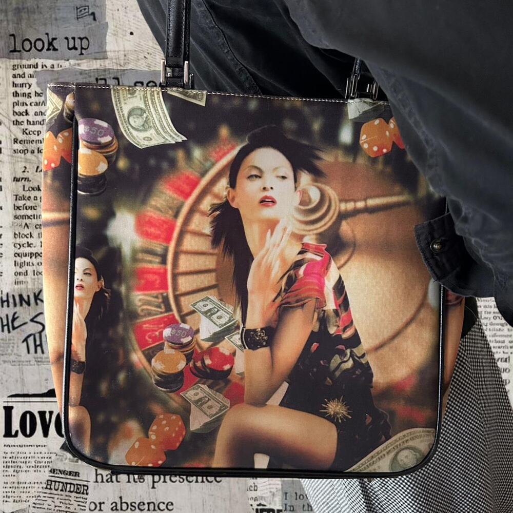 Statement graphic shoulder bag with bold casino inspired print